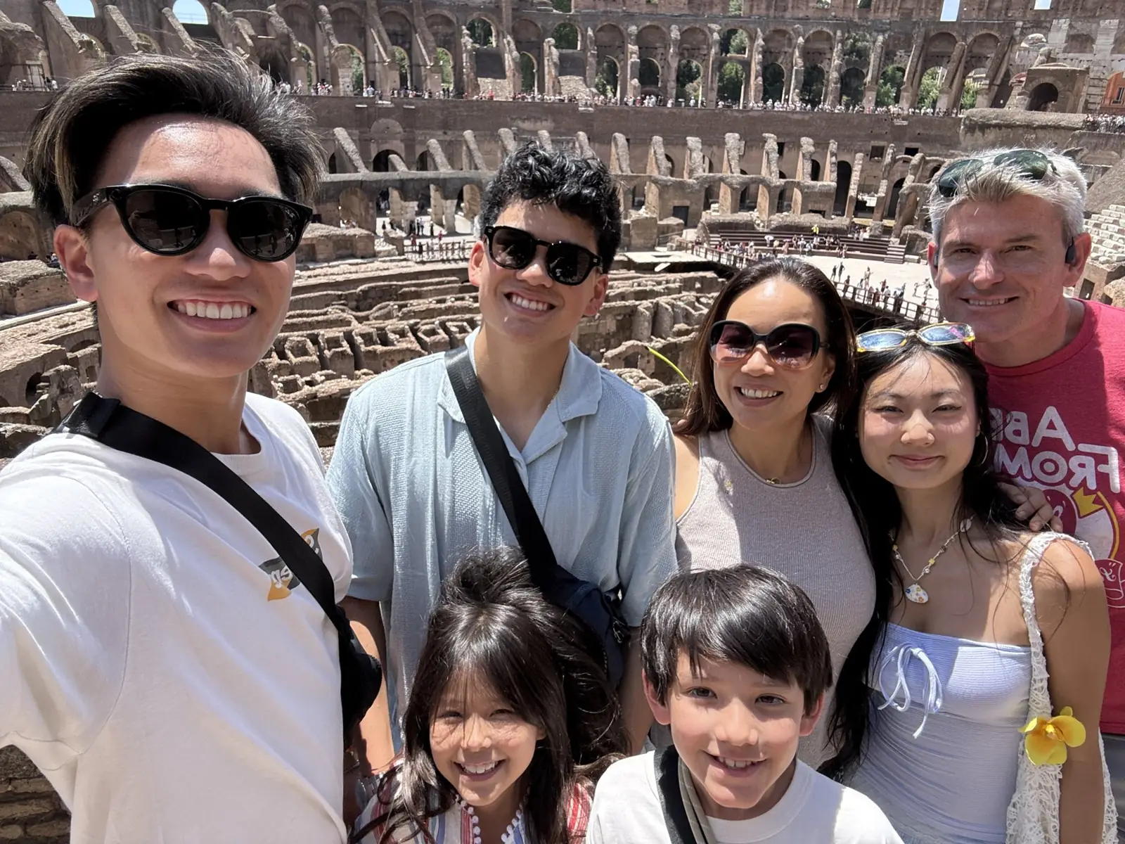 A group selfie inside the Colosseum